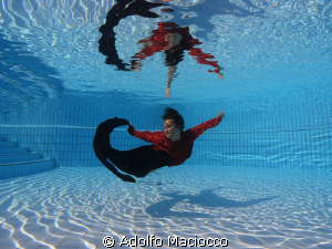 Dancing with reflections by Adolfo Maciocco 